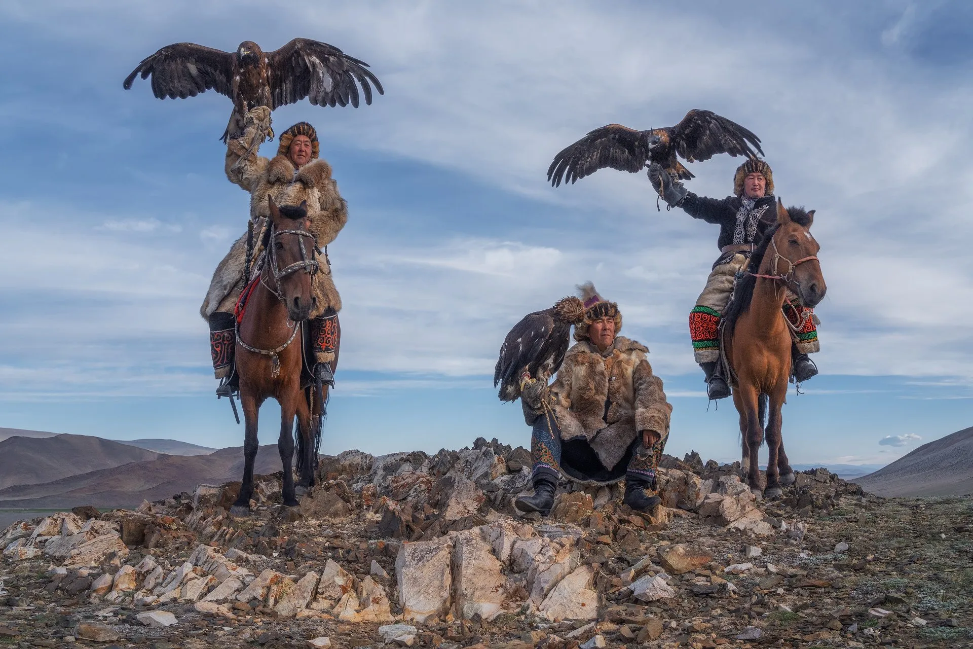 Kazakh eagle hunter during a Golden Eagle Festival tour in Mongolia